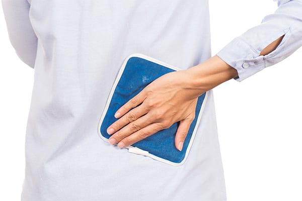 woman-with-ice-pack-on-low-back