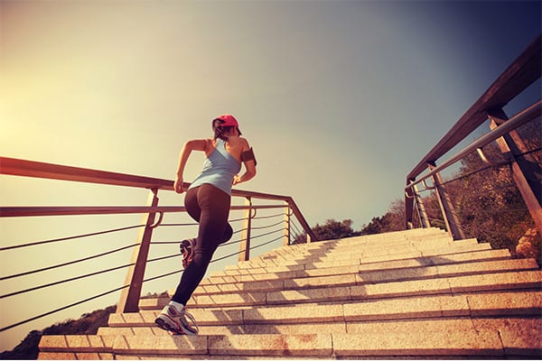 woman-running-up-stairs