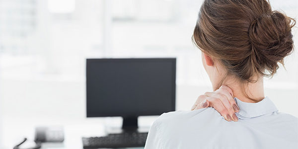 woman-at-desk-with-neck-pain