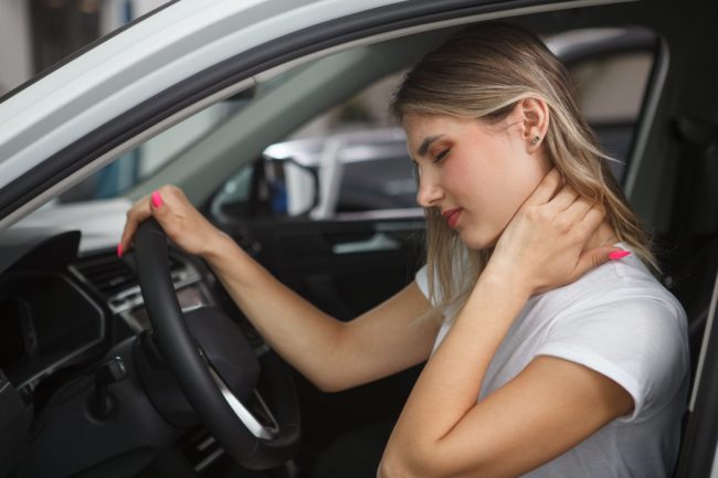 Woman with hurt neck