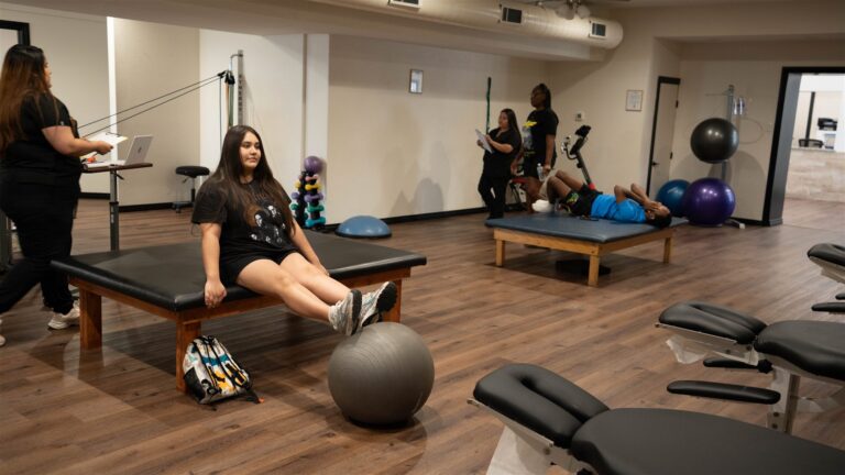 Patients doing rehab exercises in the therapy area